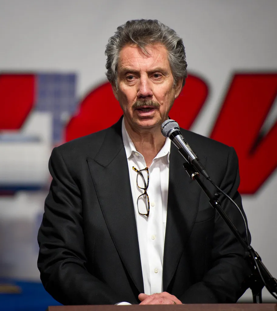 Robert Bigelow speaking at a microphone