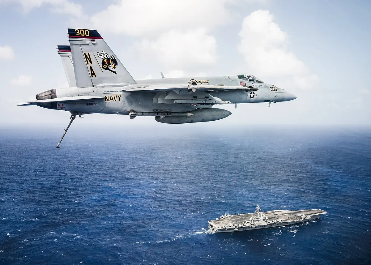 F/A-18E Super Hornet over USS Theodore Roosevelt